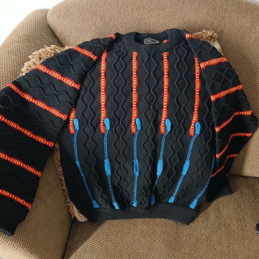 COOGI Black Crewneck Sweater with Red and Blue Accents